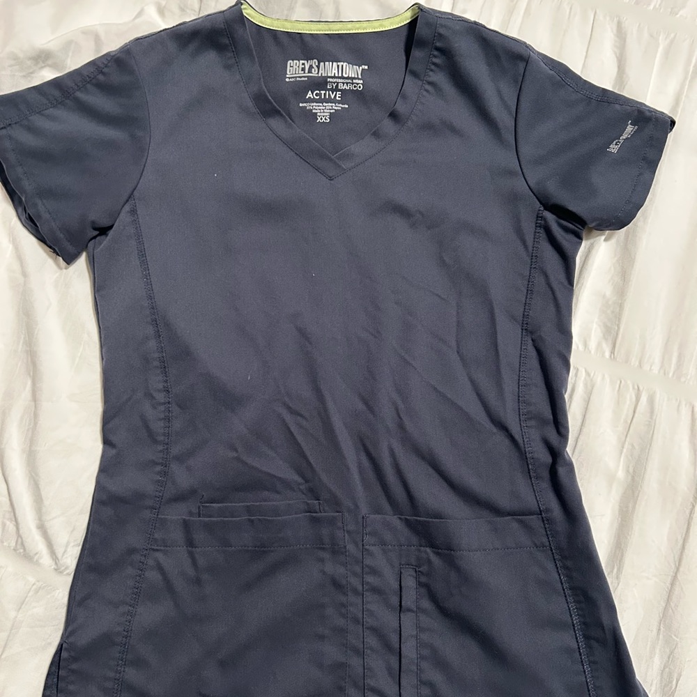 Greys anatomy scrubs xs pants and shirts. I have 3 sets of grey,3 sets of black.